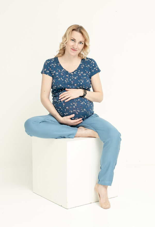 Pregnant woman in maternity clothes